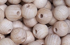 Half-drilled wooden balls